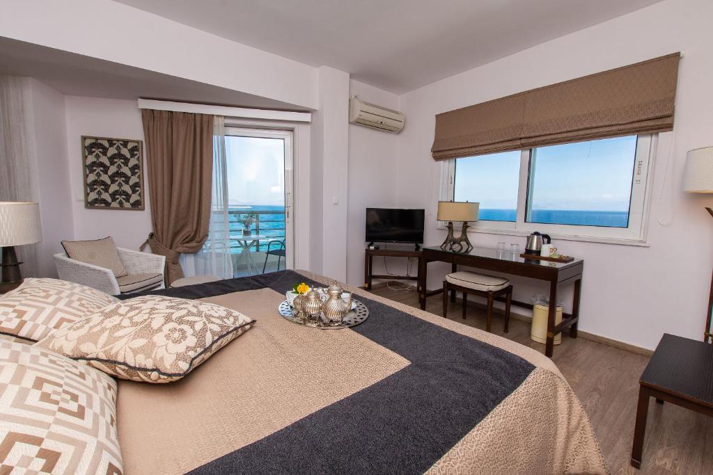 Postel nebo postele na pokoji v ubytování Mati Hotel