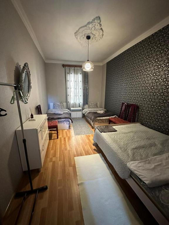 Rúm í herbergi á Guest house Amazon