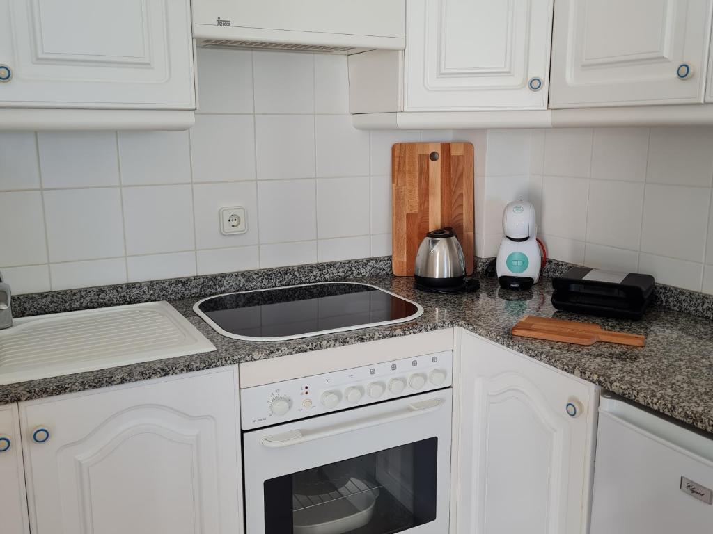 Kuchnia lub aneks kuchenny w obiekcie Cozy Waterman beach house