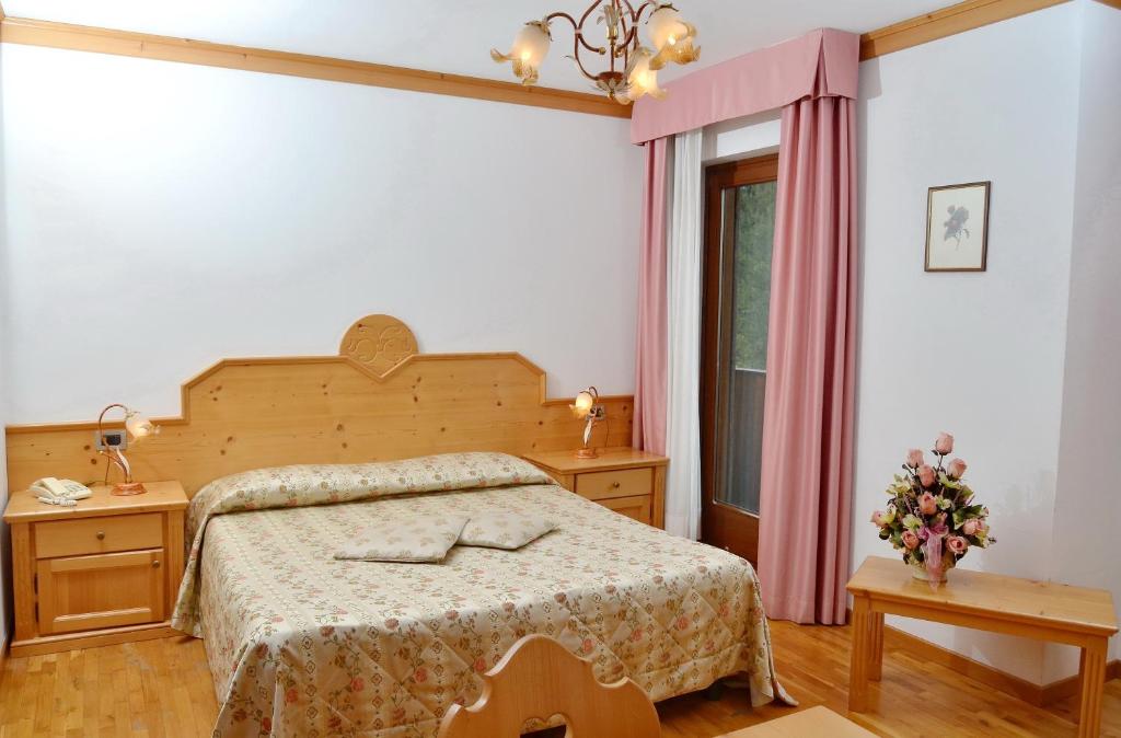 Posteľ alebo postele v izbe v ubytovaní Residence Taufer