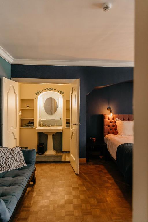 Postel nebo postele na pokoji v ubytování B&B Vrijheid 4