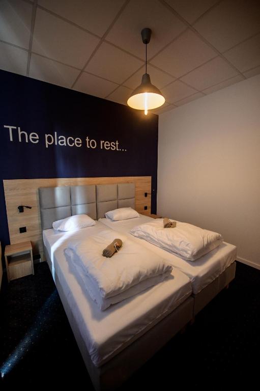 Posteľ alebo postele v izbe v ubytovaní ONRest Hostel Centrum Żytnia 8 FaktVat