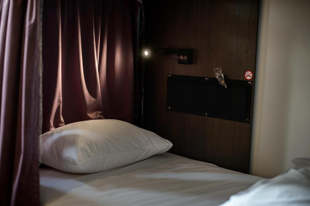 Posteľ alebo postele v izbe v ubytovaní ONRest Hostel Centrum Żytnia 8 FaktVat