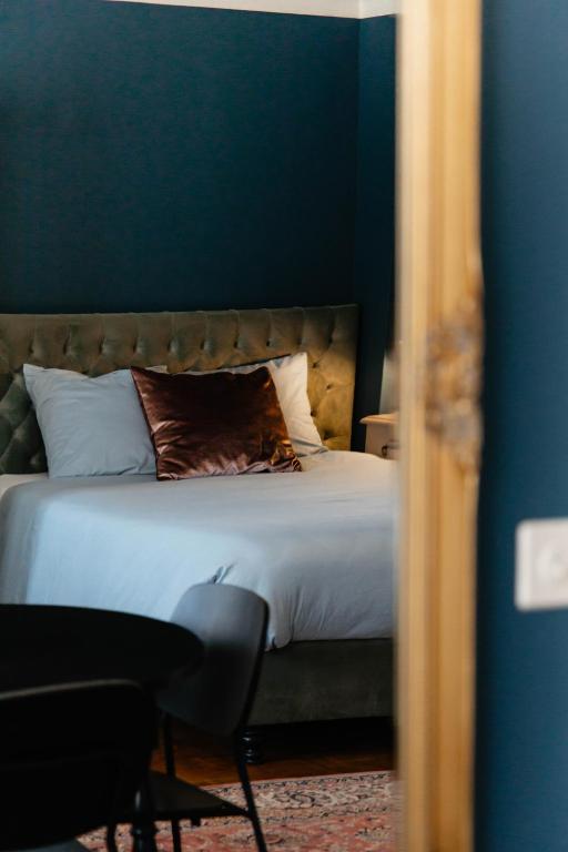 Postel nebo postele na pokoji v ubytování B&B Vrijheid 4