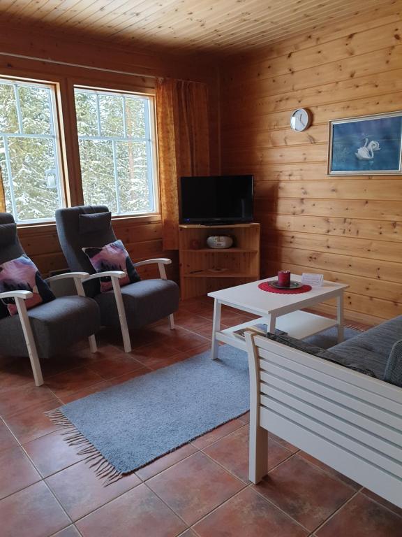 TV a/nebo společenská místnost v ubytování Lapin Lumilomat