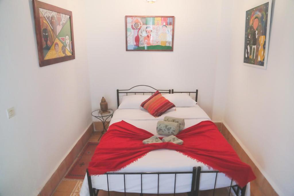 Postel nebo postele na pokoji v ubytování Riad Dar Afram