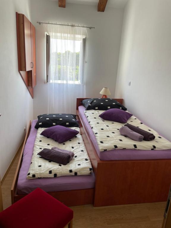 Postel nebo postele na pokoji v ubytování Villa Sea Dream Koločep