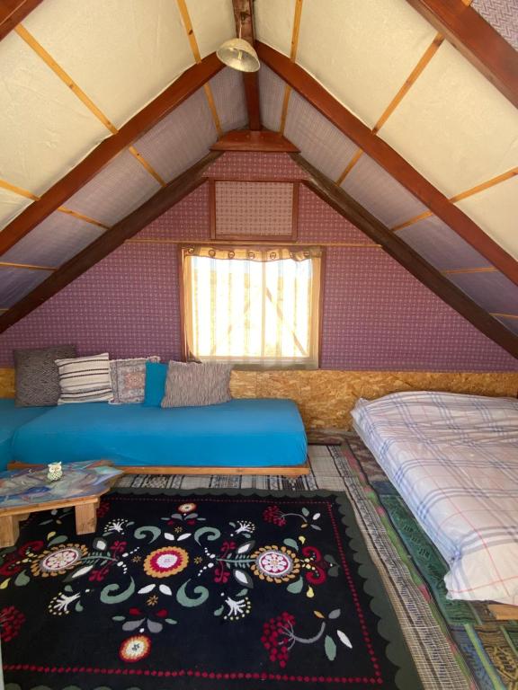 Letto o letti in una camera di Succah in the Desert