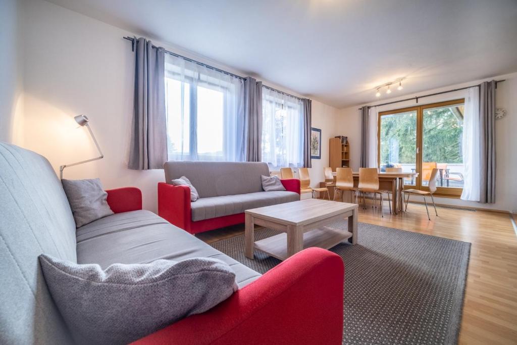 Posezení v ubytování Apartment Riviera 503-7 Lipno Home