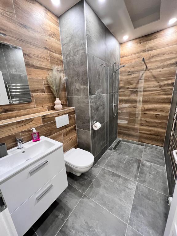 Koupelna v ubytování Apartmán SKI Plešivec