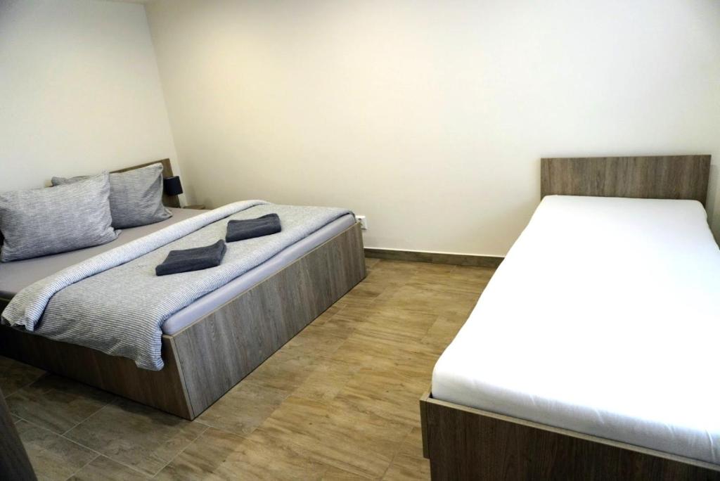 Postel nebo postele na pokoji v ubytování Vila Lada