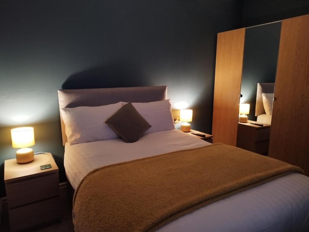מיטה או מיטות בחדר ב-Apartment 2, Aberystwyth Town Centre