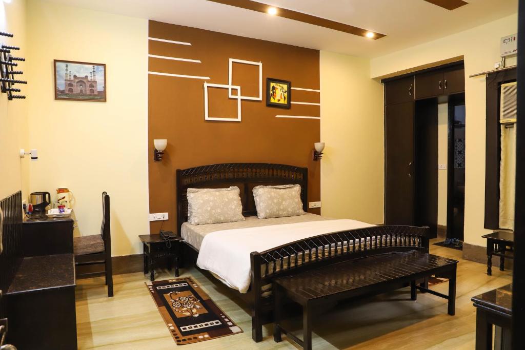 Postel nebo postele na pokoji v ubytování Pearl of Taj Home Stay