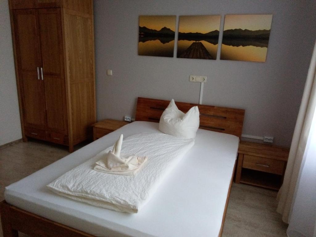 Postel nebo postele na pokoji v ubytování Hotel Ratscafe Ückeritz