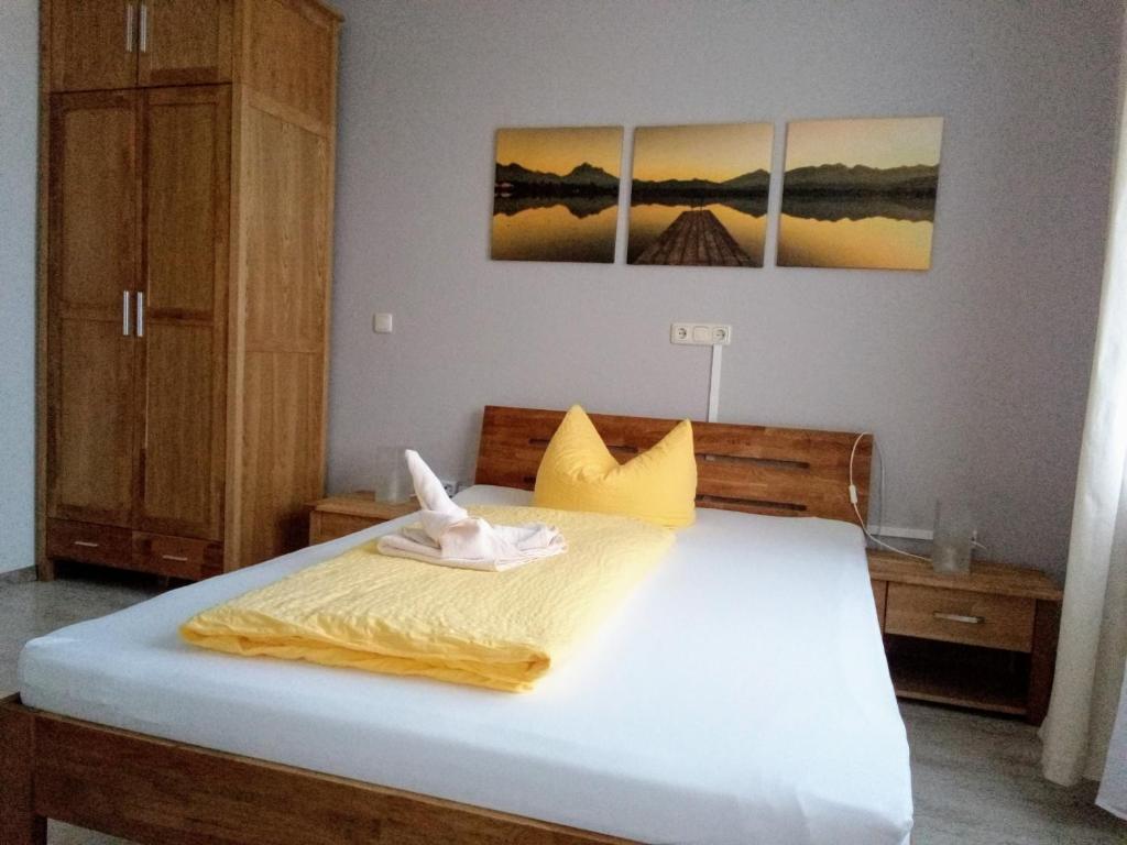 Postel nebo postele na pokoji v ubytování Hotel Ratscafe Ückeritz
