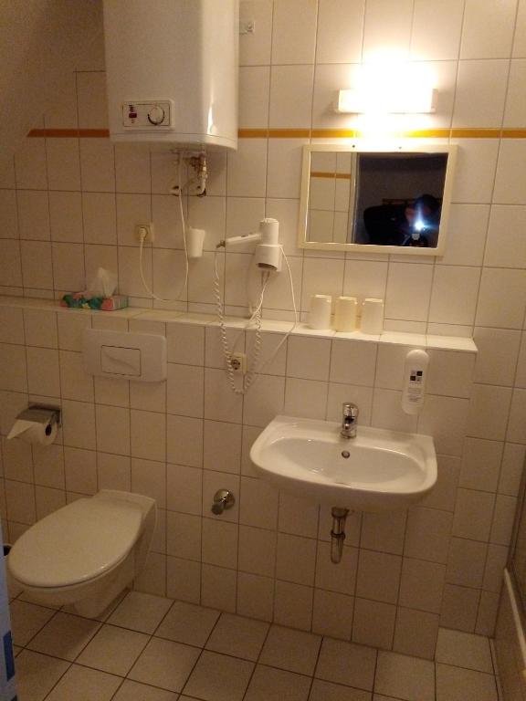 Koupelna v ubytování Hotel Ratscafe Ückeritz