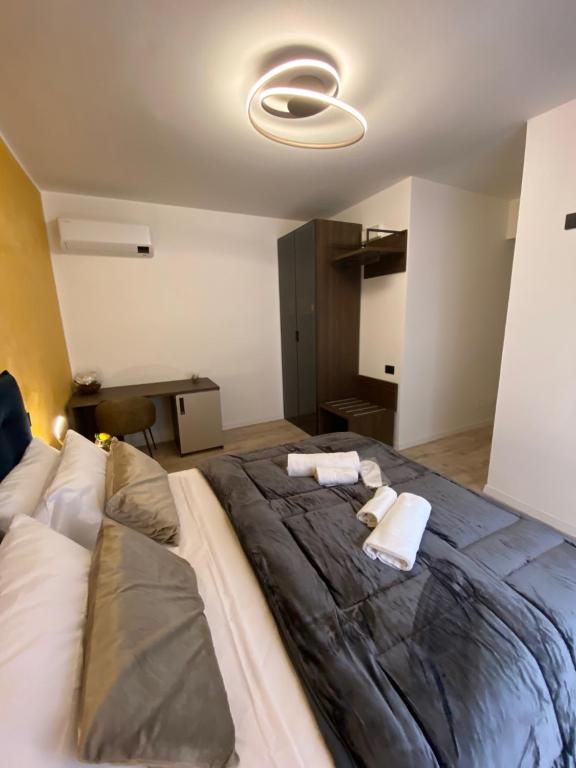Postel nebo postele na pokoji v ubytování Hotel Plaza Ungheria
