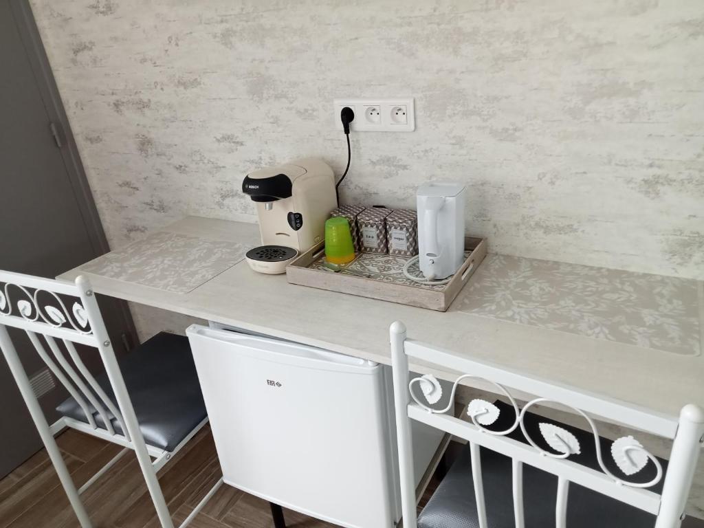 Kuchyň nebo kuchyňský kout v ubytování Chambre HORTENSIA