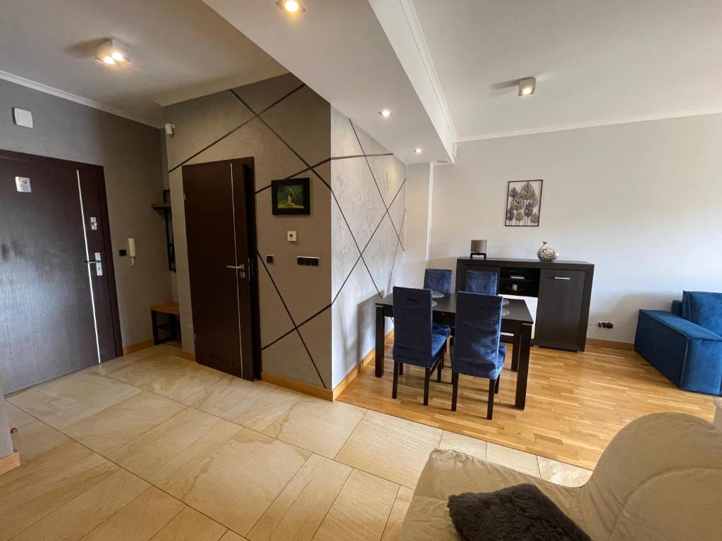 Posedenie v ubytovaní Apartament Słoneczny