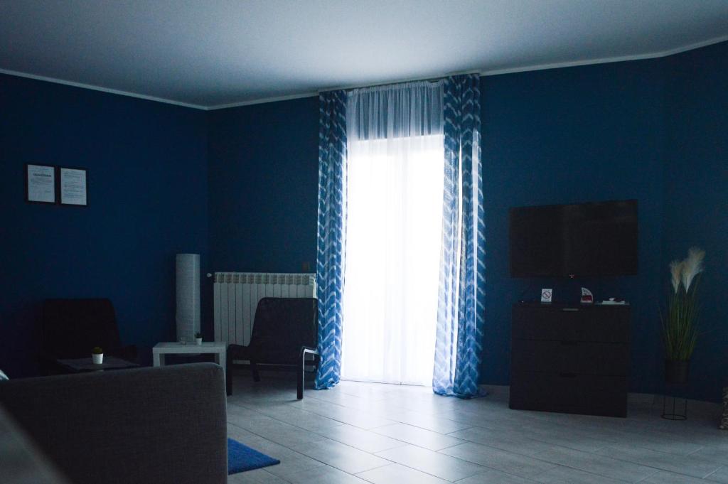 Prostor za sedenje u objektu Apartmani Tika