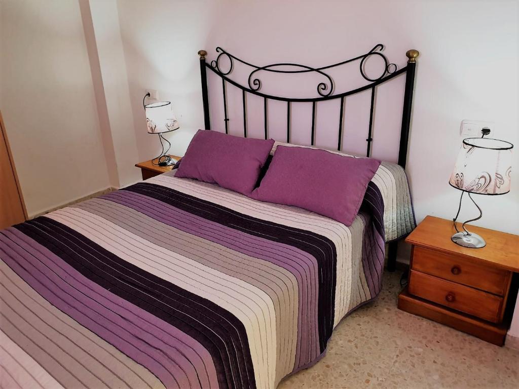 Postel nebo postele na pokoji v ubytování Hostal Gutierrez