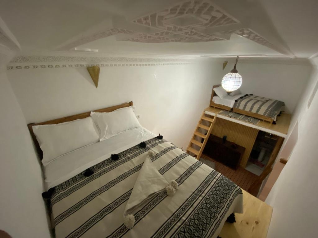 Postel nebo postele na pokoji v ubytování Hostel Capital