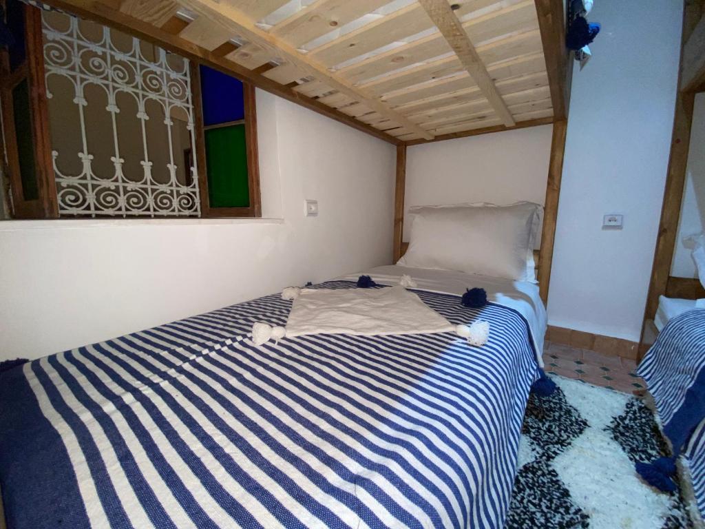 Postel nebo postele na pokoji v ubytování Hostel Capital