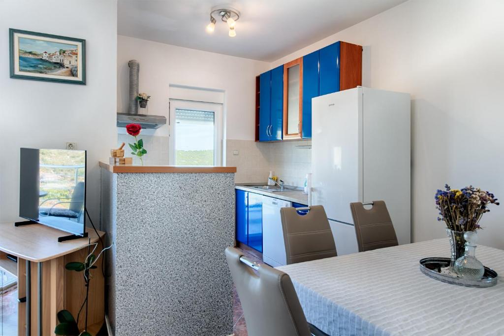 Kuchyň nebo kuchyňský kout v ubytování Apartment Diva