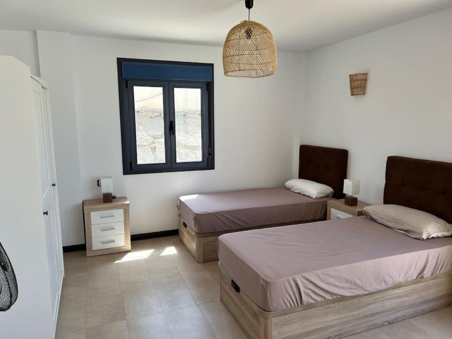 Posteľ alebo postele v izbe v ubytovaní El Cotillo Ocean View