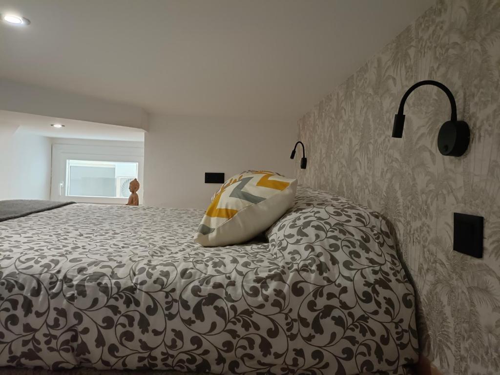Posteľ alebo postele v izbe v ubytovaní Budha Luxury Apartment Centro Histórico de Málaga