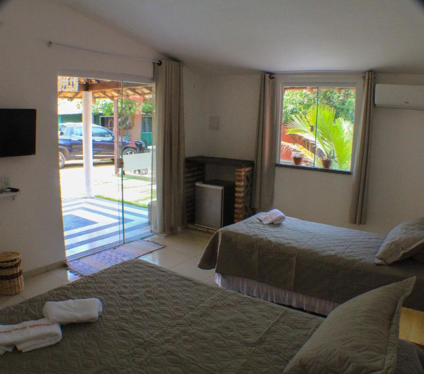 Un pat sau paturi într-o cameră la Pousada Viva Barra