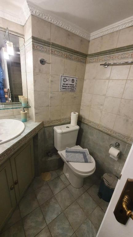 Kúpeľňa v ubytovaní Marianas Inn