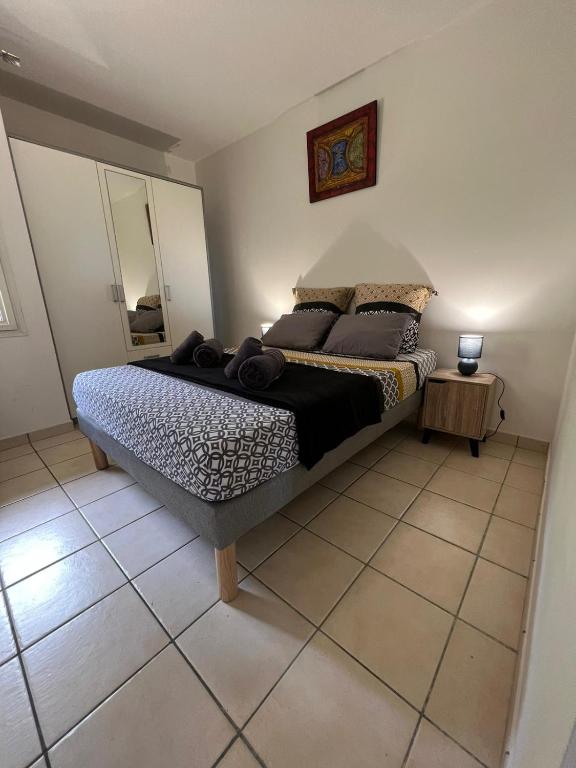 Postel nebo postele na pokoji v ubytování Les Libellules