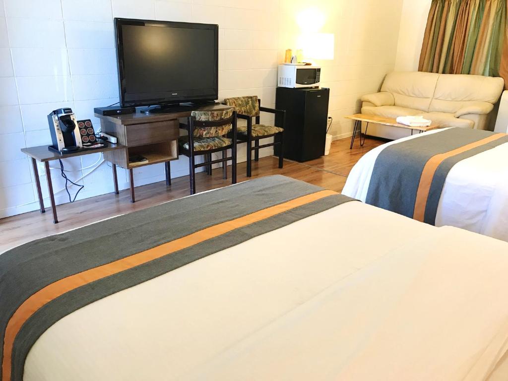Postel nebo postele na pokoji v ubytování Duncan Motel