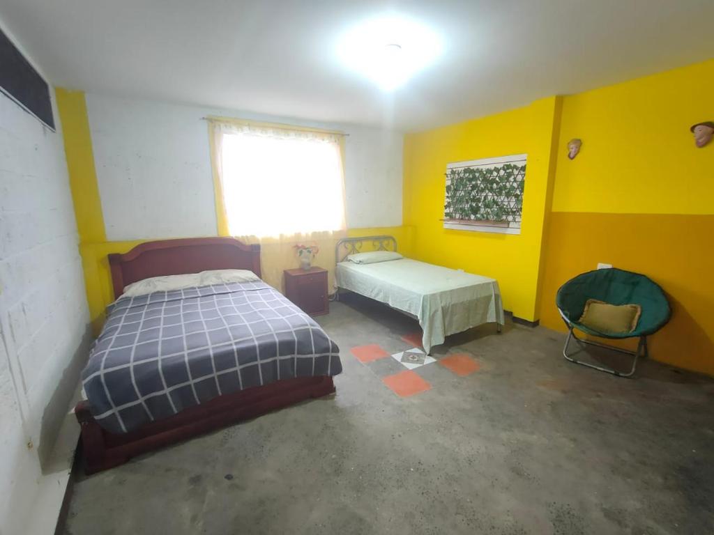 Cama o camas de una habitación en Galo Residencial