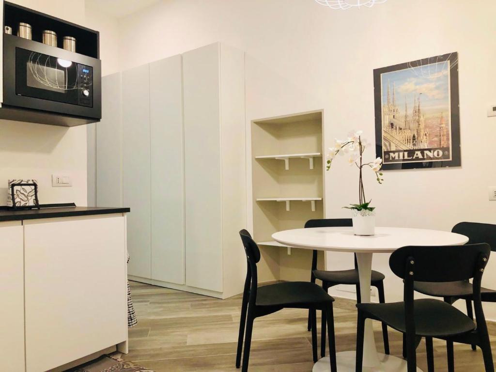 Kuchnia lub aneks kuchenny w obiekcie Glamour Liberty Apartment Sabotino38