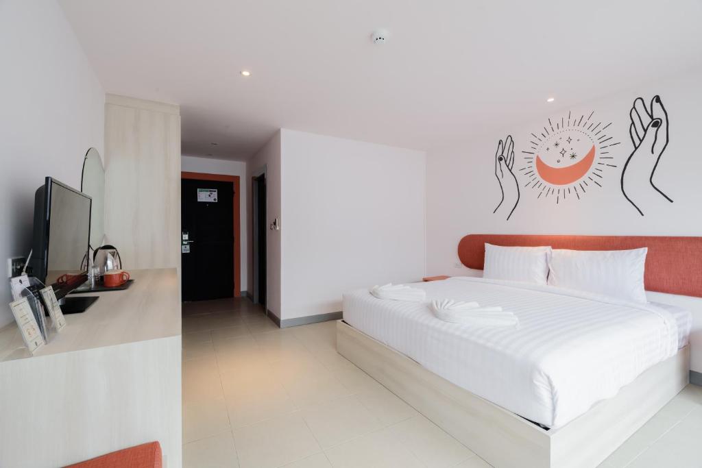 Postel nebo postele na pokoji v ubytování Moon Budget Hotel