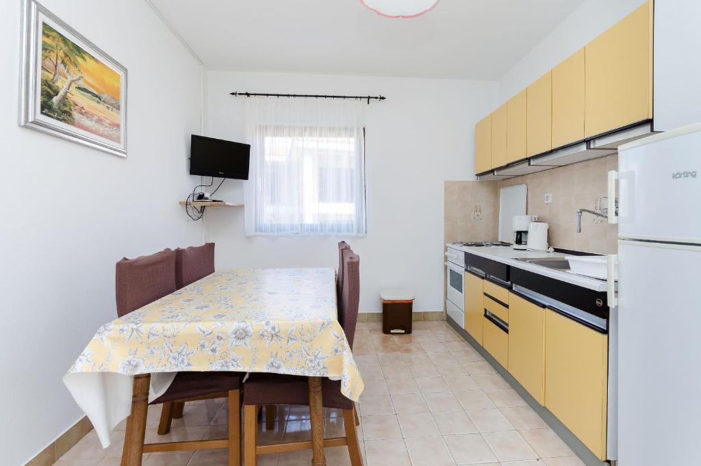 Kuchyň nebo kuchyňský kout v ubytování Apartments Ljubica J