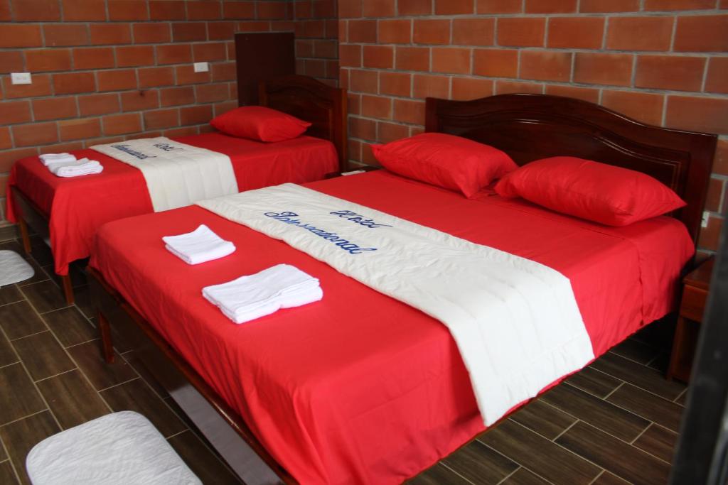 Postel nebo postele na pokoji v ubytování Hotel International