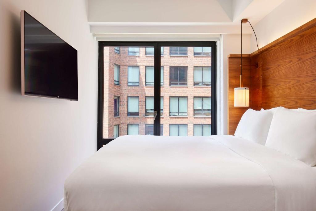 Cama ou camas em um quarto em Arlo SoHo