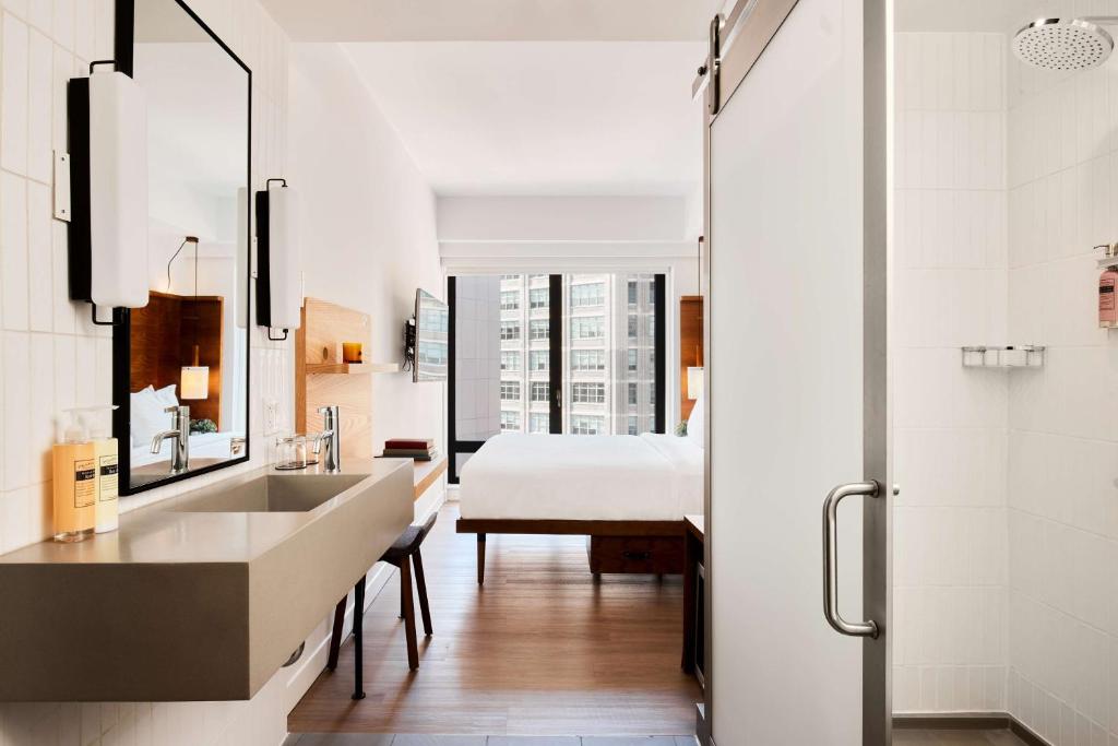 Cama ou camas em um quarto em Arlo SoHo