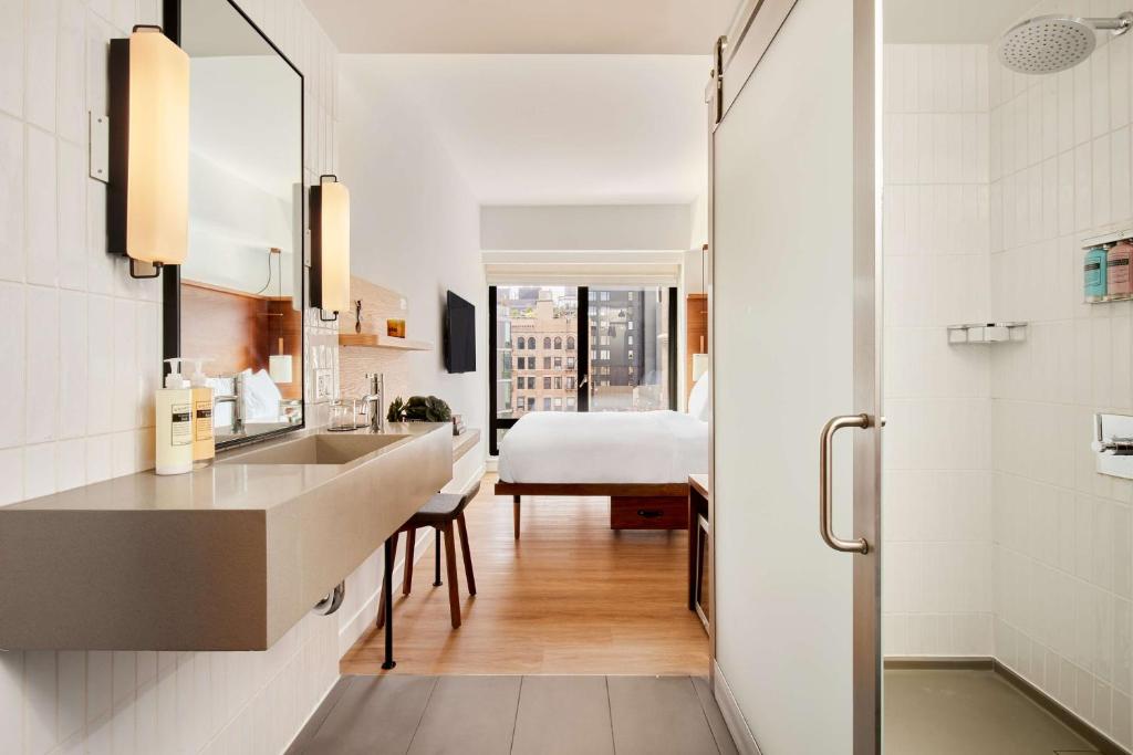 Cama ou camas em um quarto em Arlo SoHo