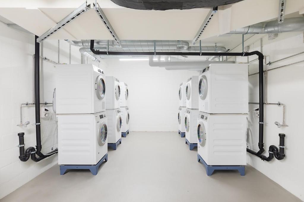 Fitness centrum a/nebo fitness zařízení v ubytování VISIONAPARTMENTS Basel - contactless check-in