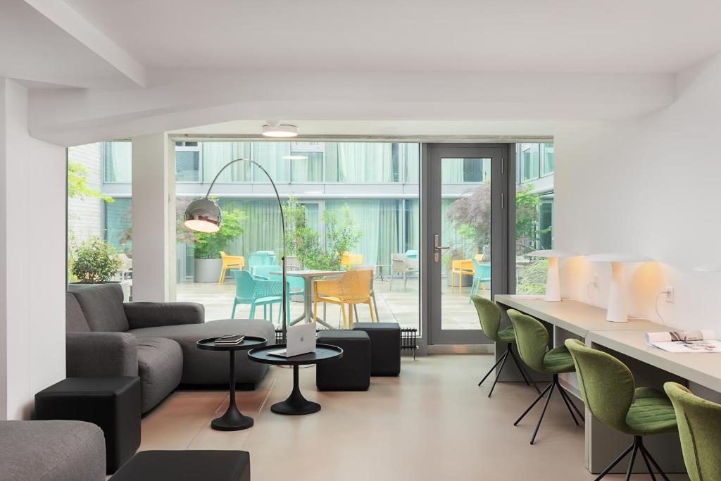 Posezení v ubytování VISIONAPARTMENTS Basel - contactless check-in