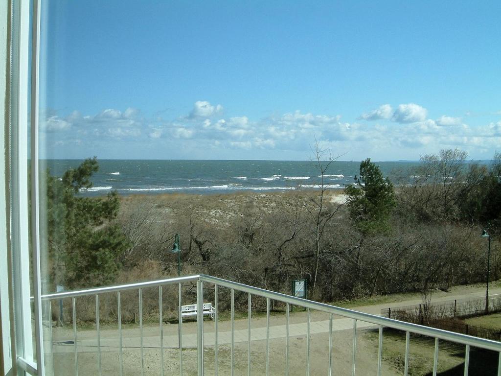 a view of the ocean from a balcony at Strandoase-Whg-14 in Heringsdorf