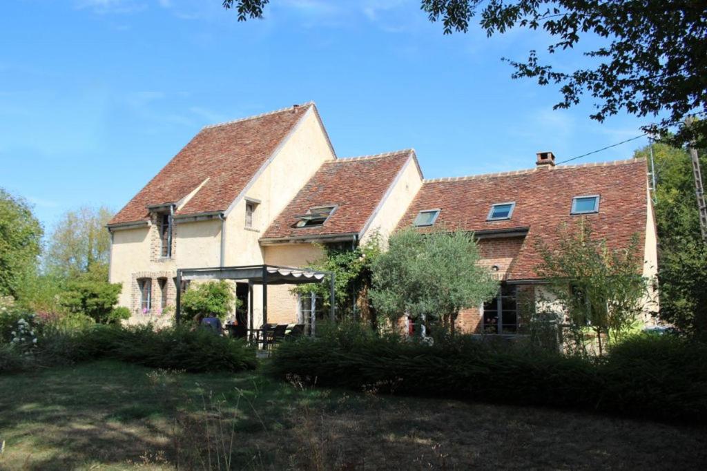 a large white house with a red roof at LES DENISOTS 12/14 PERS PISCINE PRIVEE in Lavau