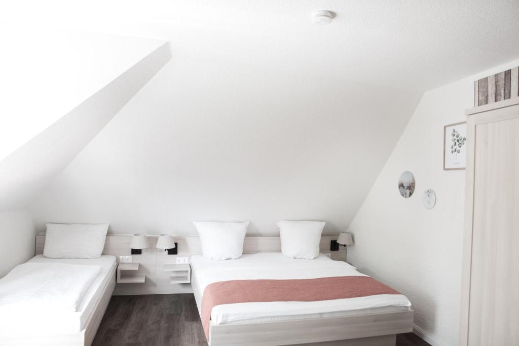 Postel nebo postele na pokoji v ubytování Hotel Up´n Diek