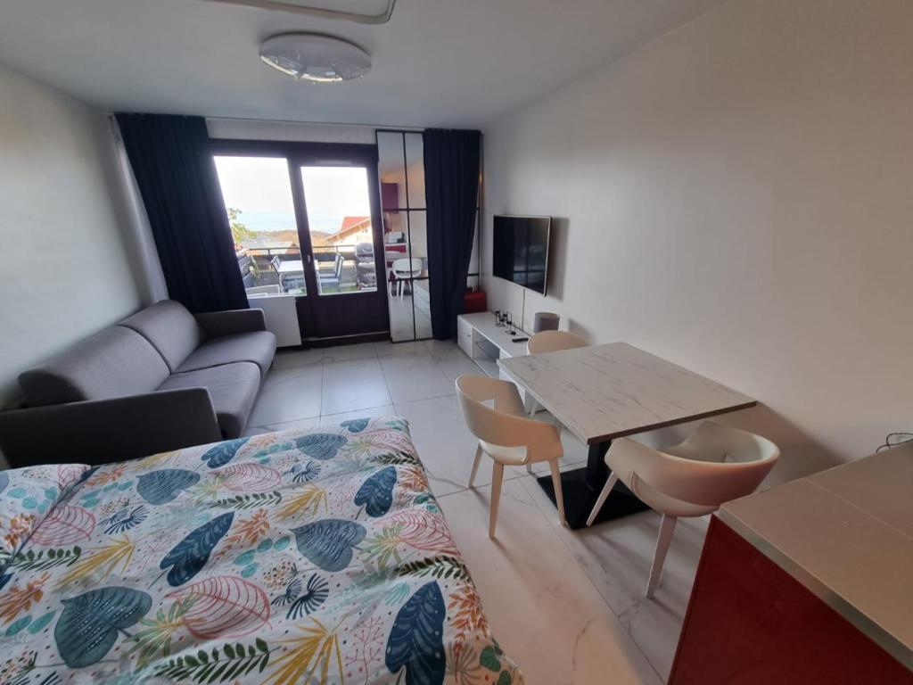 Ένα ή περισσότερα κρεβάτια σε δωμάτιο στο le 20