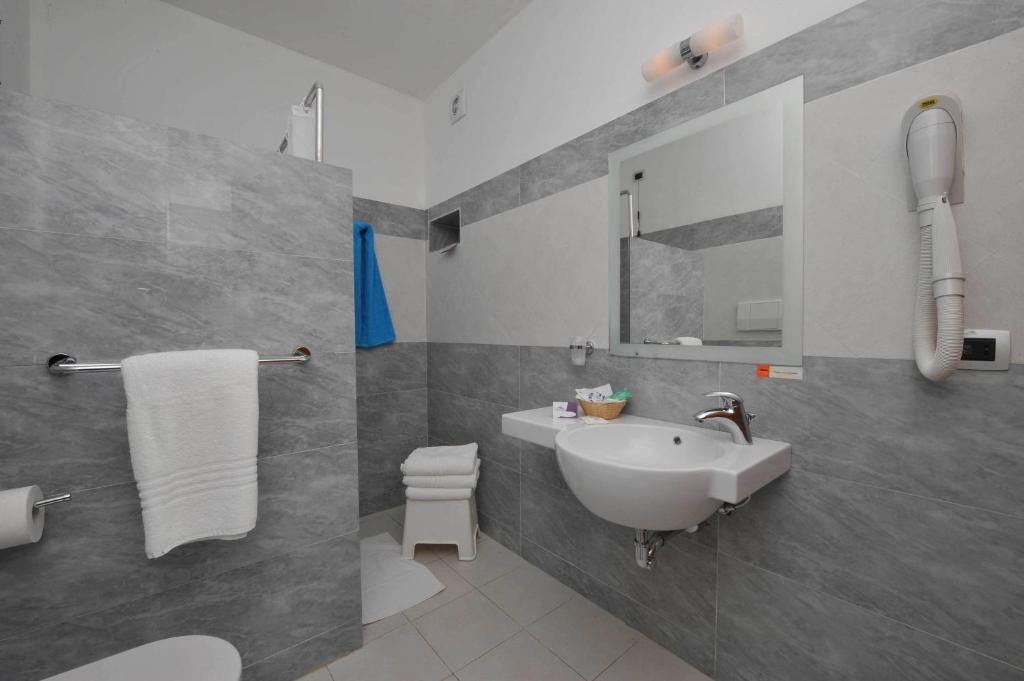 Koupelna v ubytování Hotel Club Koiné