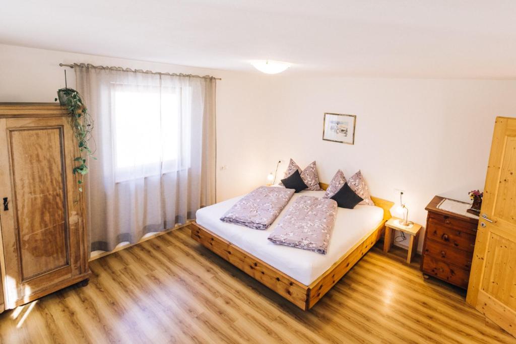 Postel nebo postele na pokoji v ubytování Stimpflhof